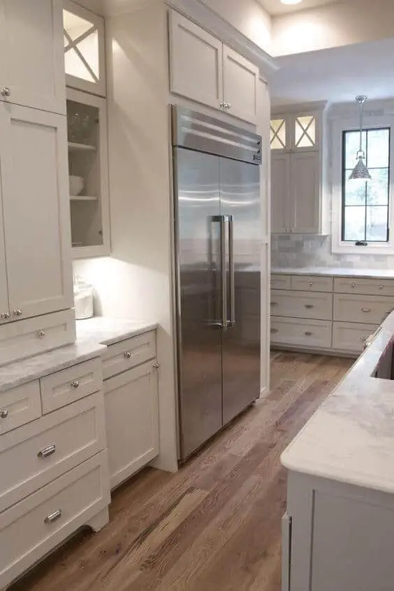 32 kitchen cabinets around refrigerator for more storage space